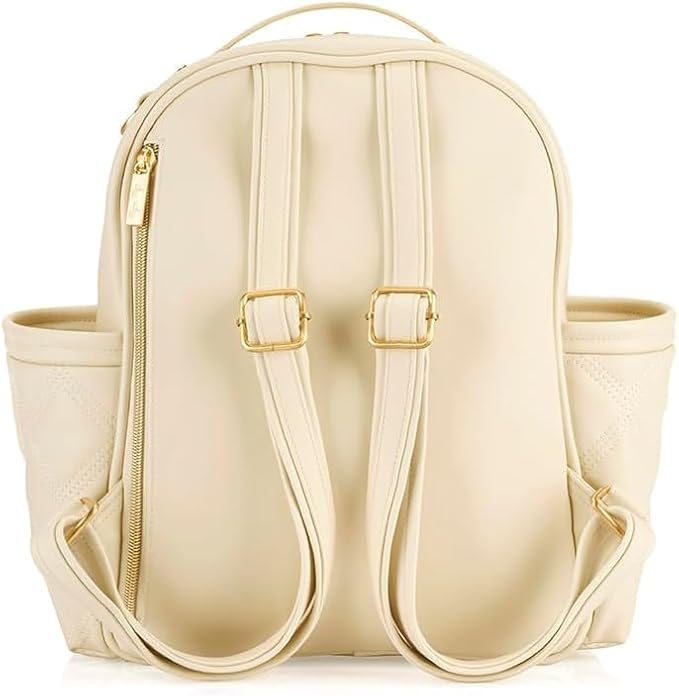 Itzy Ritzy Mini Diaper Bag Backpack – Chic, Compact Mini Plus Backpack with Changing Pad, 10 Pockets (6 Internal, 4 External), Grab-Top Handle & Rubber Feet (Milk & Honey)
