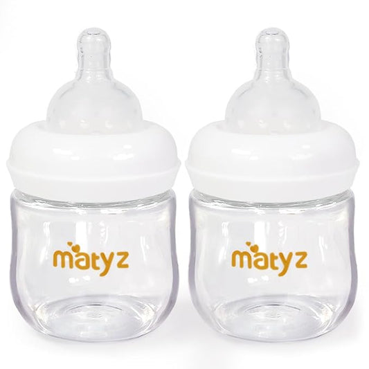 Matyz 2-Pack Glass Baby Breastfeeding Bottles With Caps (White, 4Oz) - Wide Neck New Born Bottles For Baby Breastfeeding - Breastfeeding Bottles For Newborn Babies - 4 Oz Glass Baby Bottles 0-3 Months