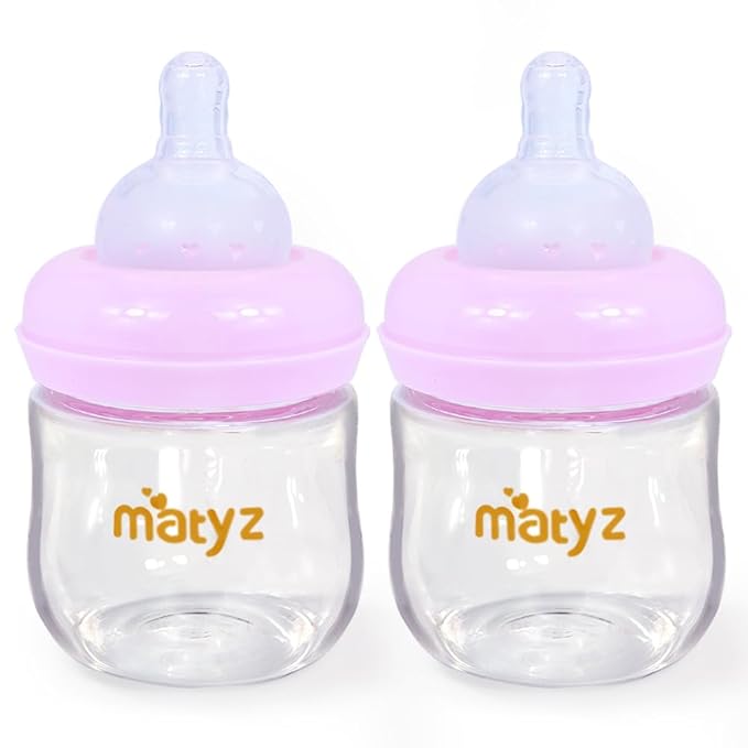 Matyz 2-Pack Glass Baby Breastfeeding Bottles with Caps (Pink, 4Oz) - Wide Neck New Born Bottles for Baby Breastfeeding - Breastfeeding Bottles for 0-3 Months Babies - Glass Baby Bottles with Nipples