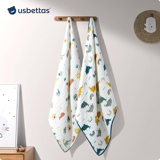 Muslin Hooded Baby Towels 2 Pack, Ultra Soft & Absorbent Baby Bath Towels, Bath & Beach Essentials, Shower Gifts for Newborns, Babies, Infant, Toddler - 32x32 Inch (Dolphin & Dinosaur)