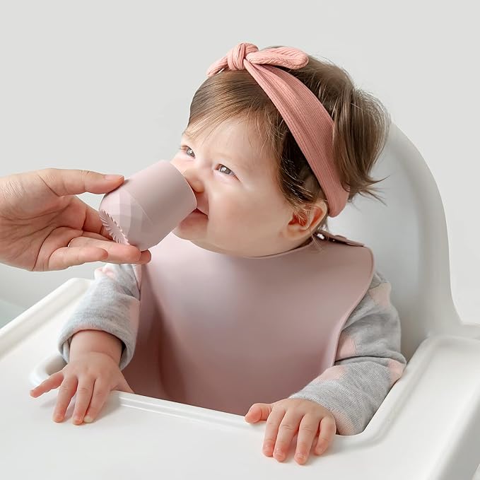 SAMiGO Silicone Baby Utensils - Self Feeding Spoons and Tiny Training Cup - First Stage Baby Led Weaning Supplies for 6 Months+ Infants - Set of 4