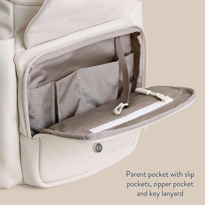 Itzy Ritzy Belong Bucket Backpack – Lightweight Diaper Bag Backpack Featuring 16 Pockets, Bucket Top Opening, Stroller Straps & Changing Pad; Organized and Stylish Everyday Family Backpack (Cream)