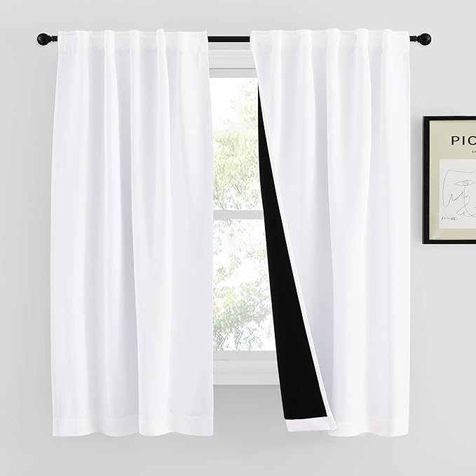 NICETOWN 100% Blackout Window Curtains, Cold and Full Light Blocking Drapes with Black Liner for Nursery, 63 Inches Drop Thermal Insulated Draperies for Loft (Pure White, 2 Pieces, 42 inches Wide)