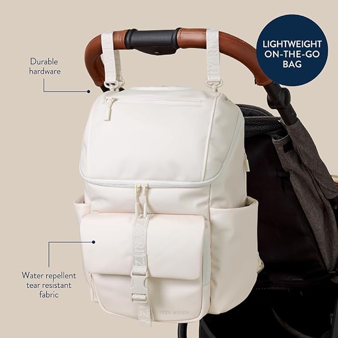 Itzy Ritzy Belong Bucket Backpack – Lightweight Diaper Bag Backpack Featuring 16 Pockets, Bucket Top Opening, Stroller Straps & Changing Pad; Organized and Stylish Everyday Family Backpack (Cream)