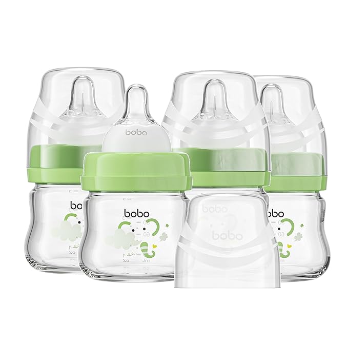 YOHKOH Glass Baby Bottles with Slow Flow Nipple, Newborn Anti-Colic Baby Bottles for 0+ Months, Wide Neck Feeding Bottle, Clear (Green, 2.7oz (Pack of 4))