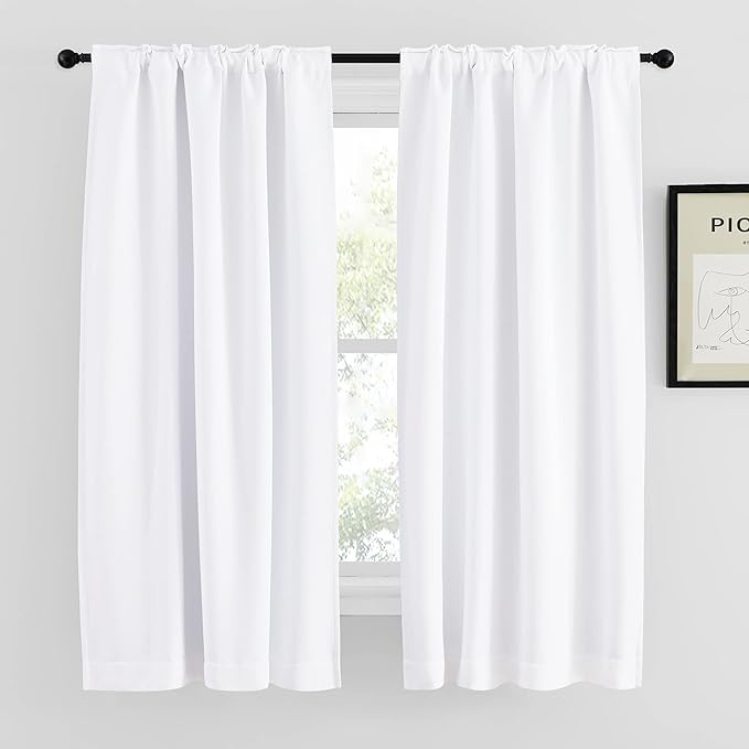 NICETOWN 100% Blackout Window Curtains, Cold and Full Light Blocking Drapes with Black Liner for Nursery, 63 Inches Drop Thermal Insulated Draperies for Loft (Pure White, 2 Pieces, 42 inches Wide)