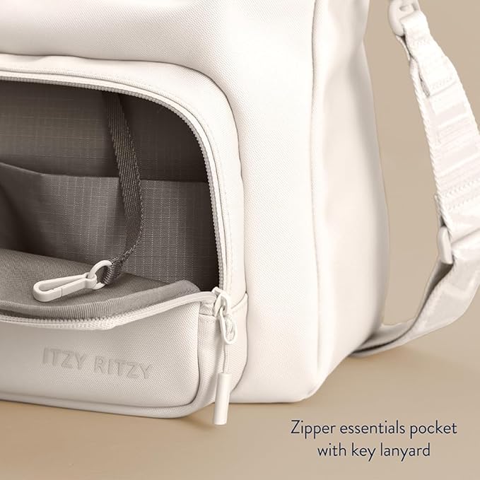 Itzy Ritzy Belong Cargo Caddy for Strollers & Wagons – Convertible Stroller Organizer and Crossbody Bag With Adjustable & Removable Strap, Bottle Holders, Smart Storage Pockets & Secure Straps (Cream)