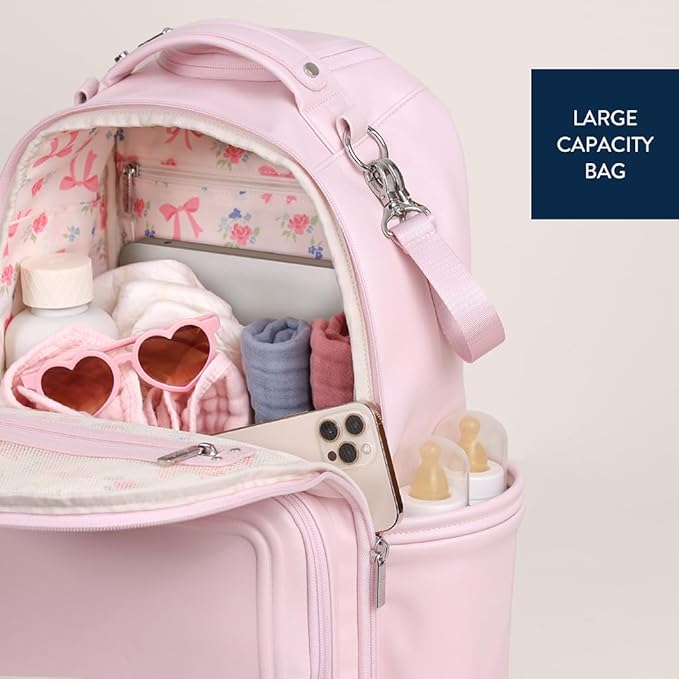 Itzy Ritzy Diaper Bag Backpack – Large Capacity Boss Plus Baby Backpack Diaper Bag Featuring 19 Pockets, Changing Pad, Stroller Clips, and Comfortable Straps (Pink Ribbons & Roses)
