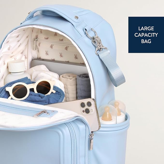 Itzy Ritzy Diaper Bag Backpack – Large Capacity Boss Plus Baby Backpack Diaper Bag Featuring 19 Pockets, Changing Pad, Stroller Clips, and Comfortable Straps (Teddy Blue)