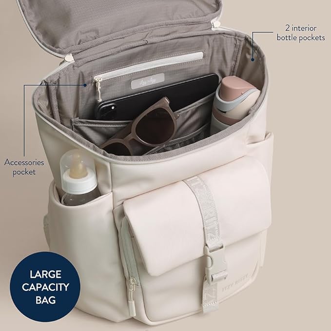 Itzy Ritzy Belong Bucket Backpack – Lightweight Diaper Bag Backpack Featuring 16 Pockets, Bucket Top Opening, Stroller Straps & Changing Pad; Organized and Stylish Everyday Family Backpack (Cream)