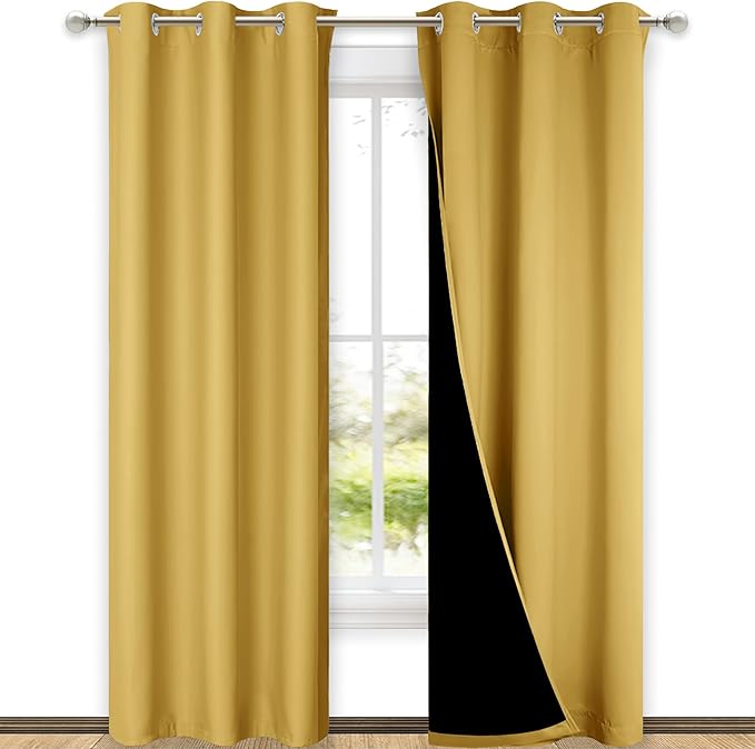NICETOWN Bright Yellow Full Shade Curtain Panels, Pair of Thermal Insulated & Energy Efficiency Blackout Drapes for Living Room Windows, Lined Silky Performance Window Dressing (42" Wide x 84" Long)