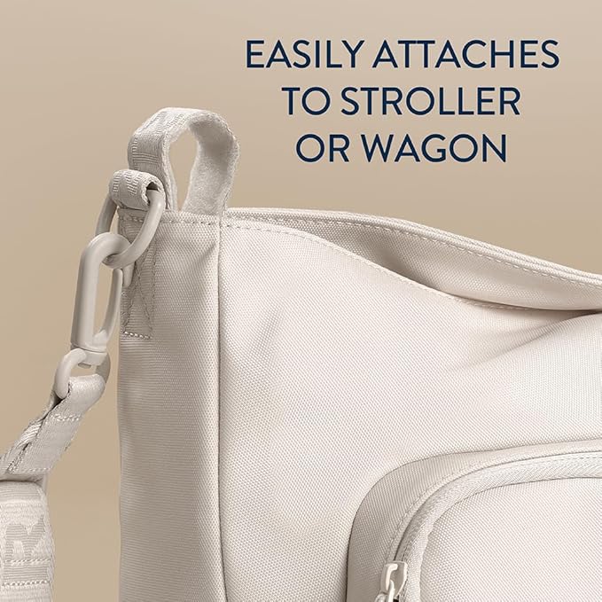 Itzy Ritzy Belong Cargo Caddy for Strollers & Wagons – Convertible Stroller Organizer and Crossbody Bag With Adjustable & Removable Strap, Bottle Holders, Smart Storage Pockets & Secure Straps (Cream)