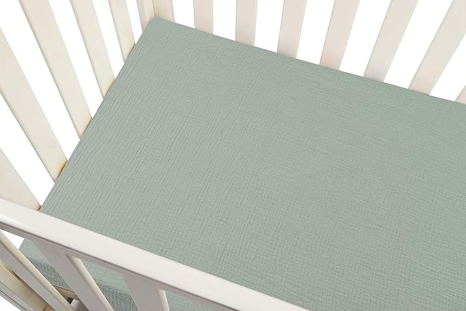 Onacosht Muslin Crib Sheets for Boys Girls, Soft Breathable 100% Cotton Baby Fitted Sheet 52" x 28" for Standard Toddler Crib Mattress, 2 Pack, Dinosaur and Light Green
