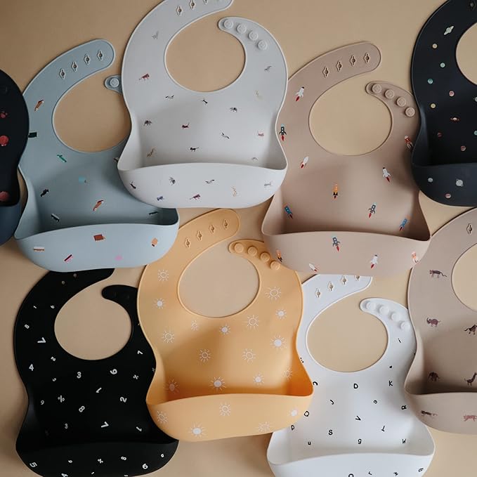 mushie Silicone Baby Bib | Adjustable Fit Waterproof Bibs (Letters White)