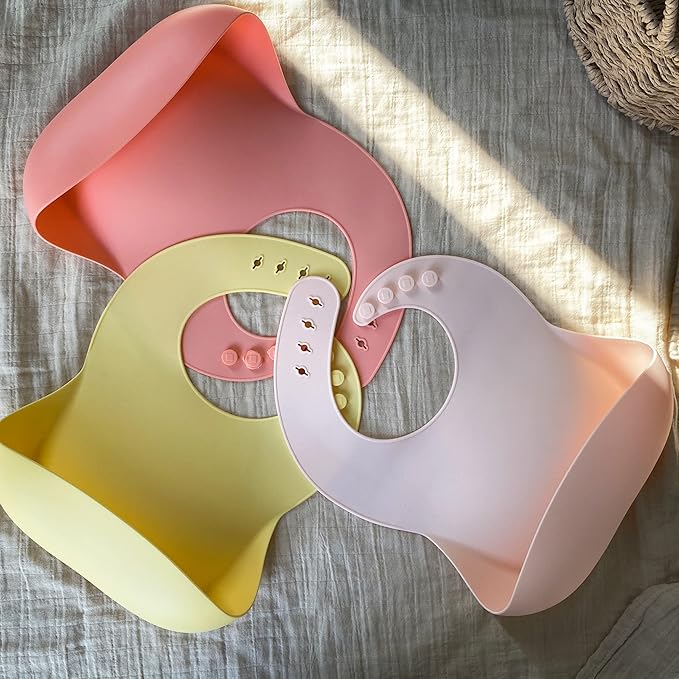 Moonkie Silicone Baby Bibs Set of 3, BPA Free Waterproof Baby Bibs for Eating, Adjustable Silicone Bibs for Babies 6-12 Months, Toddler Bibs with Pocket Food Catcher (Pink/Pastel Yellow/Soft Pink)